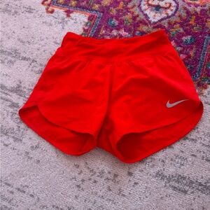 Red Nike shorts worn once women’s xs